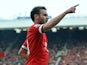 Manchester United's Spanish midfielder Juan Mata celebrates scoring their fourth goal during the English Premier League football match between Manchester United and Queens Park Rangers at Old Trafford in Manchester, north west England on September 14, 201