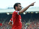 Manchester United's Spanish midfielder Juan Mata celebrates scoring their fourth goal during the English Premier League football match between Manchester United and Queens Park Rangers at Old Trafford in Manchester, north west England on September 14, 201