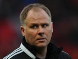 West Ham United Assistant Manager Neil McDonald looks on prior to the Barclays Premier League match between Manchester United and West Ham United at Old Trafford on December 21, 2013