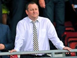 Newcastle United's English owner Mike Ashley gestures before the English Premier League football match between Southampton and Newcastle United at St Mary's Stadium in Southampton on September 13, 2014