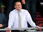 Newcastle United's English owner Mike Ashley gestures before the English Premier League football match between Southampton and Newcastle United at St Mary's Stadium in Southampton on September 13, 2014