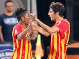 Lens' Argentine forward Pablo Chavarria (R) is congratulated by a teammate during the French L1 football match Bastia (SCB) against Lens (RCL) on September 13, 2014