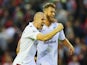 Philippe Senderos (L) of Aston Villa celebrates victory with Nathan Baker after the Barclays Premier League match against Liverpool on September 13, 2014