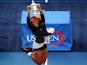 Serena Williams jumps for joy with the trophy after winning the US Open in New York on September 7, 2014