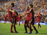 Paco Alcacer celebrates with David Silva after scoring Spain's 2nd goal during the UEFA EURO 2016 Group C Qualifier between Spain and FYR of Macedonia at Estadio Ciutat de Valencia on September 8, 2014