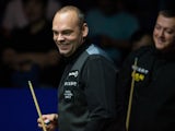 Britain's Stuart Bingham reacts during the final of the Snooker Shanghai Masters against Mark Allen of Northern Ireland in Shanghai on September 14, 2014
