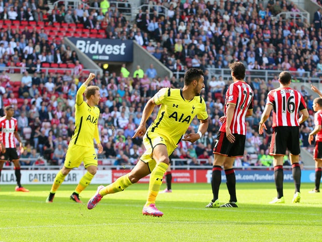 Nacer Chadli of Spurs celebrates scoring the opening goal during the Barclays Premier League match between Sunderland and Tottenham Hotspur at Stadium of Light on September 13, 2014