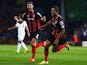 Andrew Surman (r) of AFC Bournemouth celebrates with his team scoring the opening goal during the Sky Bet Championship match against Leeds United on September 16, 2014
