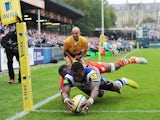 Semesa Rokoduguni of Bath scores the opening try past Vereniki Goneva of Leicester Tigers during the Aviva Premiership match between Bath and Leicester Tigers at the Recreation Ground on September 20, 2014