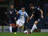 Craig Conway of Blackburn Rovers controls the ball from Craig Bryson of Derby County during the Sky Bet Championship match between Blackburn Rovers and Derby County at Ewood Park on September 17, 2014