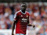 Cheikhou Kouyate of West Ham looks on during the Premier League match between West Ham United and Tottenham Hotspur at Boleyn Ground on August 16, 2014