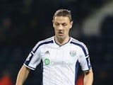 Chris Baird of West Bromwich runs with the ball during the Capital One Cup second round match between West Bromwich Albion and Oxford United at The Hawthorns on August 26, 2014