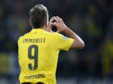 Dortmund's Italian striker Ciro Immobile celebrates scoring the 1-0 goal with during the first leg UEFA Champions League Group D football match against Arsenal on September 16, 2014