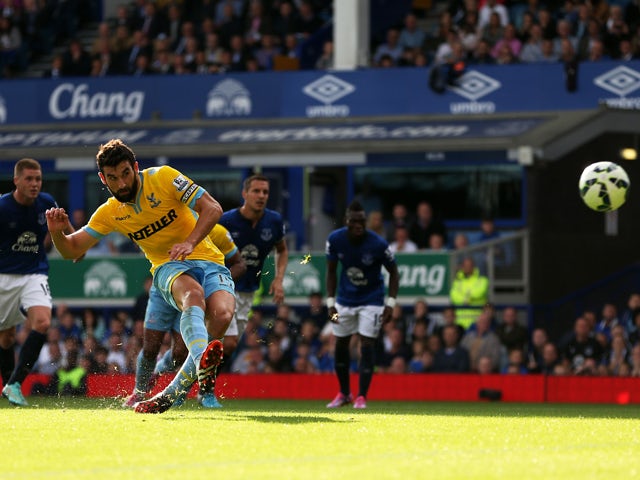 Mile Jedinak of Crystal Palace levels the scores at 1-1 as he scores from the penalty spotduring the Barclays Premier League match between Everton and Crystal Palace at Goodison Park on September 21, 2014