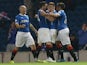 Darren McGregor (2-R) of Rangers celebrates his goal with teammate Lewis McLeod during the Scottish League Cup match between Rangers and Inverness in Glasgow on September 16, 2014