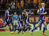 Anderlecht players celebrate their goal by midfielder Dennis Praet against Galatasaray during their UEFA Champions Leauge group D match on September 16, 2014