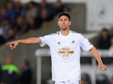 Swansea player Federico Fernandez in action during the Capital One Cup Second Round match between Swansea City and Rotherham United at Liberty Stadium on August 26, 2014