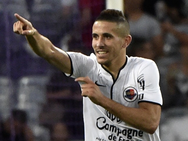 Caen's French forward Florian Raspentino celebrates after scoring a goal during the French L1 football match Toulouse vs Caen on September 20, 2014