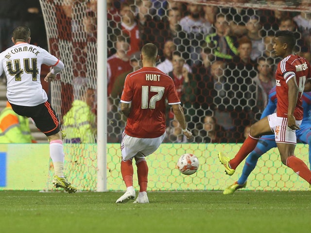 Ross McCormack of Fulham scores their third goal during the Sky Bet Championship match between Nottingham Forest and Fulham at the City Ground on September 17, 2014