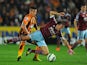 Hull player Jake Livermore challenges Mark Noble of West Ham during the Barclays Premier League match between Hull City and West Ham United at KC Stadium on September 15, 2014