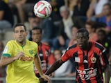 Nantes' Israeli forward Itay Shechter (L) vies with Nice's French and Haitian defender Romain Genevois during the French L1 football match between Nantes (FCN) and Nice (OGCN) on September 20, 2014