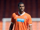 Jacob Mellis of Blackpool in action during the Pre Season Friendly match between Blackpool and Burnley at Bloomfield Road on August 2, 2014