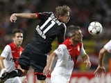 Monaco's French midfielder Jeremy Toulalan (R) vies for the ball with Leverkusen's forward Stefan Kiessling (2nd L) during the Champions League football match on September 16, 2014