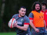 Wales forward Ken Owens in action as Adam Jones looks on during the Wales training session at the Vale Hotel on February 11, 2014