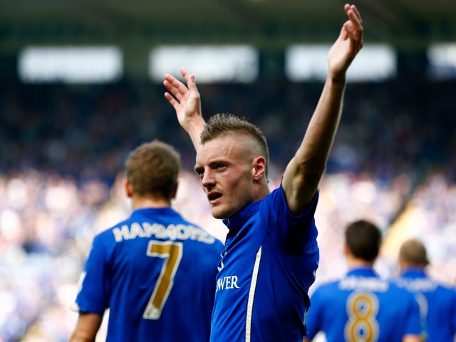 Jamie Vardy of Leicester City celebrates after scoring his team's fourth goal during the Barclays Premier League match between Leicester City and Manchester United at The King Power Stadium on September 21, 2014