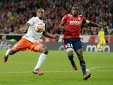 Lille's Montenegran defender Marko Basa vies with Montpellier's Senegalese forward Souleymane Camara during a French L1 football match between Lille and Montpellier on September 21, 2014