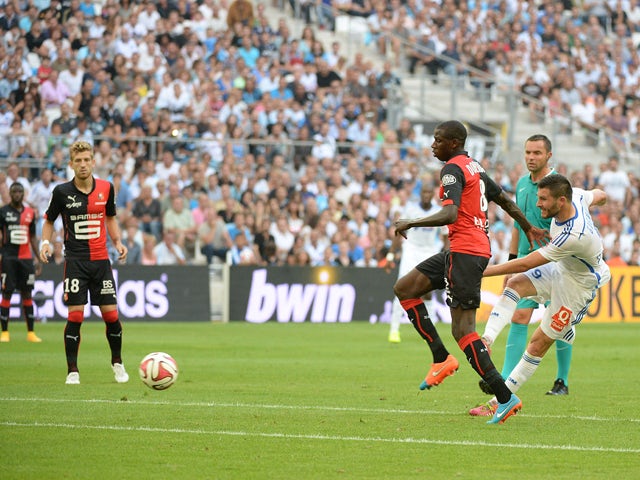 Marseille's French forward Andre-Pierre Gignac scores his second goal during the French L1 football match Olympique of Marseille (OM) versus Rennes at the Velodrome stadium in Marseille, on September 20, 2014