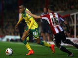 Martin Olsson of Norwich attacks during the Sky Bet Championship match between Brentford and Norwich City at Griffin Park on September 16, 2014