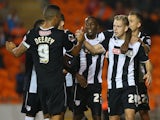 Matej Vydra of Watford celebrates with teammates after scoring the opening goal during the Sky Bet Championship match against Blackpool on September 16, 2014