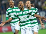 Sporting Lisbon's Nani (C) celebrates with teammates after scoring during the UEFA Group G Champions League footbal match NK Maribor vs Sporting Lisbon in Maribor, Slovenia on September 17, 2014