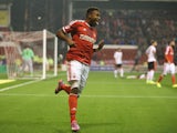 Britt Assombalonga of Nottingham Forest celebrates after scoring the first goal during the Sky Bet Championship match between Nottingham Forest and Fulham at the City Ground on September 17, 2014