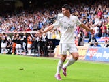 James Rodriguez of Real Madrid CF celebrates after scoring his team's second goal during the La Liga match between RC Deportivo La Coruna and Real Madrid CF at Riazor Stadium on September 20, 2014