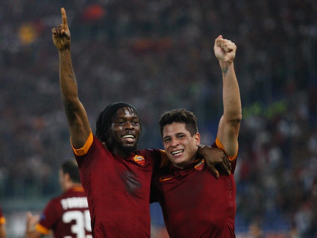 Gervinho with his teammate Juan Manuel Iturbe of AS Roma celebrates after scoring the second team's goal during the UEFA Champions League Group E match between AS Roma and PFC CSKA Moskva on September 17, 2014