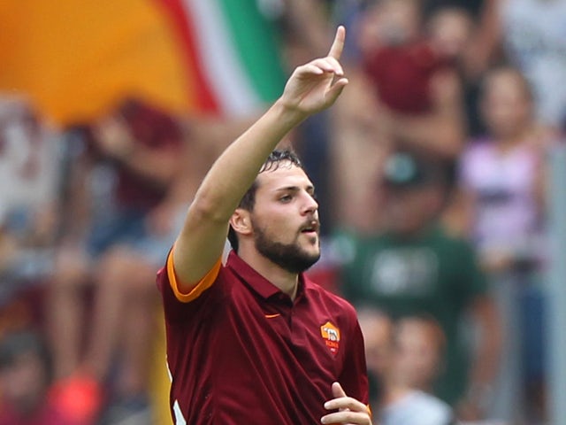 Mattia Destro of AS Roma celebrates after scoring the opening goal during the Serie A match between AS Roma and Cagliari Calcio at Stadio Olimpico on September 21, 2014