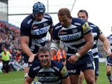 Tom Brady of Sale Sharks is congratulated after scoring a try against London Welsh during the Aviva Premiership match between Sales Sharks and London Welsh at A J Bell Stadium on September 20, 2014