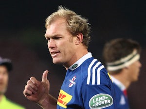 Stormers captain Schalk Burger chats to Referee Jaco Peyper during the Super Rugby match between DHL Stormers and Cell C Sharks at DHL Newlands Stadium on July 12, 2014