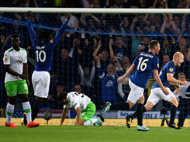 Steven Naismith (R) of Everton celebrates after scoring the opening goal during the UEFA Europa League Group H match between Everton and VFL Wolfsburg on September 18, 2014