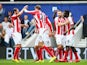 Mame Biram Diouf of Stoke City celebrates scoring the opening goal with team mates during the Barclays Premier League match between Queens Park Rangers and Stoke City at Loftus Road on September 20, 2014