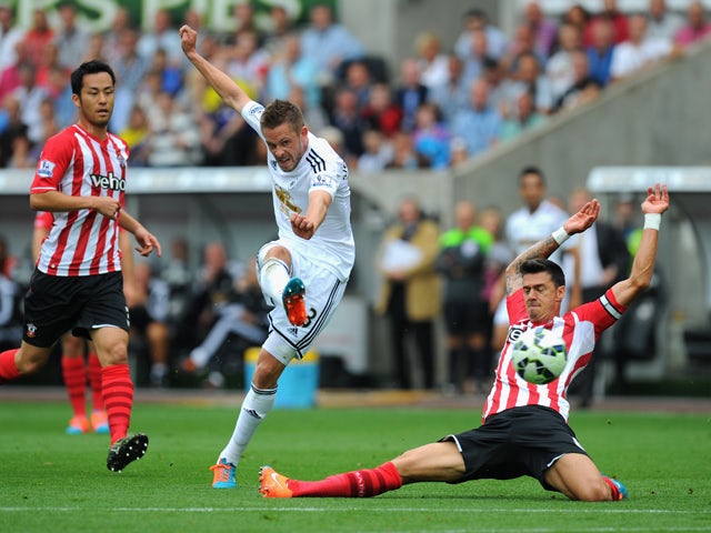 Gylfi Sigurdsson of Swansea shoots at goal during the Barclays Premier League match between Swansea City and Southampton at Liberty Stadium on September 20, 2014