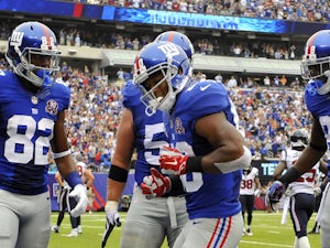 Giants beat Texans for first win of 2014