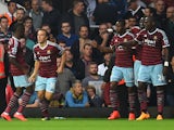 Diafra Sakho #15 of West Ham is congratulated by teammates after scoring his team's second goal during the Barclays Premier League match between West Ham United and Liverpool at Boleyn Ground on September 20, 2014