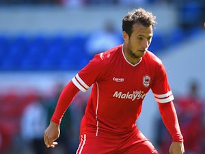 Adam Le Fondre of Cardiff in action during the friendly match between Cardiff City and VFL Wolfsburg at Cardiff City Stadium on August 2, 2014