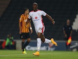 Benik Afobe of MK Dons celebrates after scoring his sides 1st goal during the Capital One Cup Third Round match between MK Dons and Bradford City on September 23, 2014