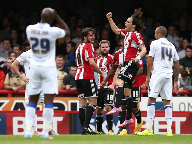 Peleteiro Ramallo of Brentford celebrates after he scored to make it 1-0 during the Sky Bet Championship match between Brentford and Leeds United at Griffin Park on September 27, 2014