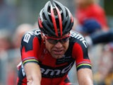 Cadel Evans of Australia and BMC Racing Team looks exhausted as he crosses the finish line during the eighteenth stage of the 2014 Giro d'Italia, a 171km high mountain on May 29, 2014