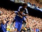 Diego Costa of Chelsea is congratiulated by teammate Willian of Chelsea after scoring his team's second goal during the Barclays Premier League match between Chelsea and Aston Villa at Stamford Bridge on September 27, 2014